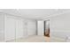 Bright bedroom with neutral carpet, walk-in closet, and private access to bathroom at 1505 N Cansler St, Kings Mountain, NC 28086