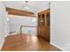 This dining room features wood floors, a built-in china cabinet, and a chandelier at 1505 N Cansler St, Kings Mountain, NC 28086