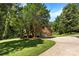 Spacious brick home with a three-car garage and mature landscaping at 1505 N Cansler St, Kings Mountain, NC 28086