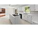 Beautiful kitchen features an island cooktop, stainless appliances and backyard views at 1505 N Cansler St, Kings Mountain, NC 28086