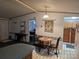 Dining area adjacent to kitchen featuring a breakfast bar and room for a table and chairs at 16711 Indian Mound Rd, Albemarle, NC 28001