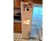The refrigerator is a Frigidaire with a water dispenser, and is decorated with magnets at 16711 Indian Mound Rd, Albemarle, NC 28001