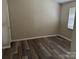 Neutral bedroom with hardwood flooring, offering a serene and comfortable space at 1814 Birch Heights Ct, Charlotte, NC 28213