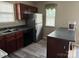 Functional kitchen with modern stainless steel appliances and ample cabinet space for storage at 1814 Birch Heights Ct, Charlotte, NC 28213