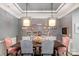 The dining room features modern lighting and space for entertaining at 2009 Freeport Dr, Indian Trail, NC 28079