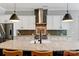 Well-equipped kitchen boasting a large island, stainless steel hood, and updated appliances at 2009 Freeport Dr, Indian Trail, NC 28079