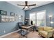 Office space features modern fixtures, natural light, and a ceiling fan at 2009 Freeport Dr, Indian Trail, NC 28079