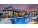 Stunning backyard with a sparkling pool, lounge chairs, and an outdoor dining area, perfect for entertaining at 2009 Freeport Dr, Indian Trail, NC 28079