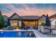 Beautiful pool with outdoor dining and lounge chairs, perfect for relaxing and entertaining at 2009 Freeport Dr, Indian Trail, NC 28079