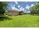 Huge backyard with a covered deck and lots of grass at 205 Honey Moss Ln, Salisbury, NC 28146