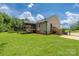 Spacious backyard with an elevated deck, perfect for outdoor entertaining and enjoying the view at 205 Honey Moss Ln, Salisbury, NC 28146