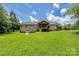 Wide view of the large backyard and exterior of the home at 205 Honey Moss Ln, Salisbury, NC 28146