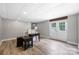 Spacious basement with concrete block walls and wood-style vinyl flooring at 205 Honey Moss Ln, Salisbury, NC 28146