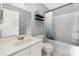 Bathroom featuring a vanity sink, toilet, and shower with shower curtain at 205 Honey Moss Ln, Salisbury, NC 28146
