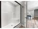 Clean bathroom showcasing an enclosed shower with glass door at 205 Honey Moss Ln, Salisbury, NC 28146