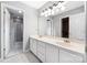 Bright bathroom featuring double vanity sinks and walk-in shower at 205 Honey Moss Ln, Salisbury, NC 28146