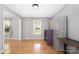 Bright bedroom with hardwood floors and large windows offering natural light at 205 Honey Moss Ln, Salisbury, NC 28146
