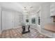 Cozy breakfast nook with a unique glass table and ample natural light at 205 Honey Moss Ln, Salisbury, NC 28146