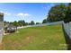 Spacious, well-maintained backyard with white fence, gazebo, and lush green grass at 2301 Amesbury Ct, Albemarle, NC 28001
