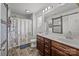 Bright bathroom features dual sinks, and modern fixtures at 2301 Amesbury Ct, Albemarle, NC 28001