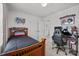 Inviting bedroom boasts neutral carpeting, decor, and a black desk chair creating an inviting and relaxing retreat at 2301 Amesbury Ct, Albemarle, NC 28001