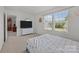 Bright bedroom with big windows, and views of the neighborhood at 2301 Amesbury Ct, Albemarle, NC 28001