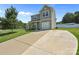 Charming two-story home with well-maintained landscaping, a two-car garage, and a wide driveway at 2301 Amesbury Ct, Albemarle, NC 28001