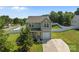 Charming two-story home with a well-manicured lawn and a white picket fence at 2301 Amesbury Ct, Albemarle, NC 28001