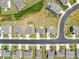 Aerial view of a residential area with lush green lawns and tree-lined streets at 2512 Andes Dr, Statesville, NC 28625