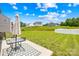 Lush backyard with green grass, a patio area, and outdoor furniture for relaxing and entertaining at 2512 Andes Dr, Statesville, NC 28625