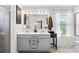 Bright bathroom features a double sink vanity, framed mirror, and great natural light from the window at 2512 Andes Dr, Statesville, NC 28625