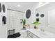 Stylish bathroom featuring a tub and shower combo, modern fixtures, and ample decorations at 2512 Andes Dr, Statesville, NC 28625