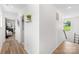 Upstairs hallway with view of the laundry and a bedroom at 2512 Andes Dr, Statesville, NC 28625
