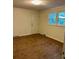 Bedroom featuring laminate flooring and windows providing lots of natural light at 2660 Tiffany St, Conover, NC 28613