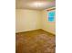 This bedroom has carpeted floors and a window with backyard view at 2660 Tiffany St, Conover, NC 28613