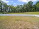 View of the backyard at 404 Saddlebred Ln, Locust, NC 28097
