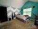Comfortable bedroom featuring vaulted ceilings and plenty of natural light at 4205 Springhaven Dr, Charlotte, NC 28269