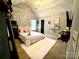Cozy bedroom featuring a plush rug, charming decor, and a peaceful ambiance at 4205 Springhaven Dr, Charlotte, NC 28269
