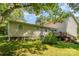 Expansive backyard with lush green grass, back deck, and mature trees at 4919 Rehobeth Rd, Waxhaw, NC 28173