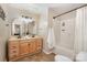 Bathroom features double vanity and shower over tub at 4919 Rehobeth Rd, Waxhaw, NC 28173