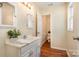 Bright bathroom boasts white vanity and toilet in separate room at 4919 Rehobeth Rd, Waxhaw, NC 28173