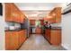 Kitchen features stainless steel appliances, light wood cabinetry, and tile flooring at 4919 Rehobeth Rd, Waxhaw, NC 28173