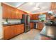 Kitchen with stainless steel appliances, light wood cabinetry, and neutral countertops at 4919 Rehobeth Rd, Waxhaw, NC 28173