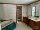 Bathroom featuring a tub, shower, double vanity, tile floors, and bright, natural light at 5816 Scotland Yard Rd, Rock Hill, SC 29732