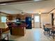 Bright kitchen with a center island, wood cabinets, and eat-in area at 5816 Scotland Yard Rd, Rock Hill, SC 29732