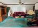 Inviting living room with a fireplace, plush seating, and ample natural light at 5816 Scotland Yard Rd, Rock Hill, SC 29732