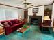 Comfortable living room with a fireplace, plush sofa, and traditional decor at 5816 Scotland Yard Rd, Rock Hill, SC 29732
