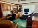 Office featuring a desk, shelves, chair, carpet, and bright natural light at 5816 Scotland Yard Rd, Rock Hill, SC 29732