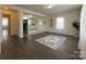 Bright open concept living space and kitchen featuring wood flooring and light paint at 608 E 11Th St, Newton, NC 28658