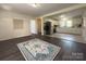 Open concept home, with modern kitchen, stainless appliances, and connected living space with wood flooring at 608 E 11Th St, Newton, NC 28658